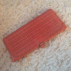 light peachy orange clutch from American Eagle!